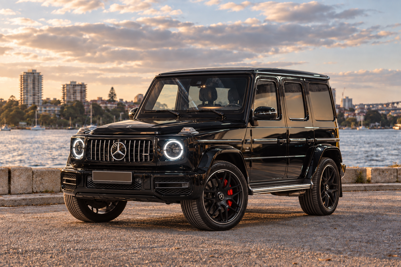 Mercedes-AMG G63 on a Sydney waterfront backdrop at sunset